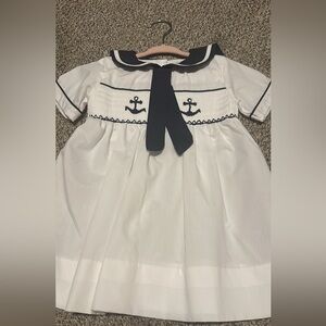 Elegant White and Navy Kids Dress with Smocked Anchor Design